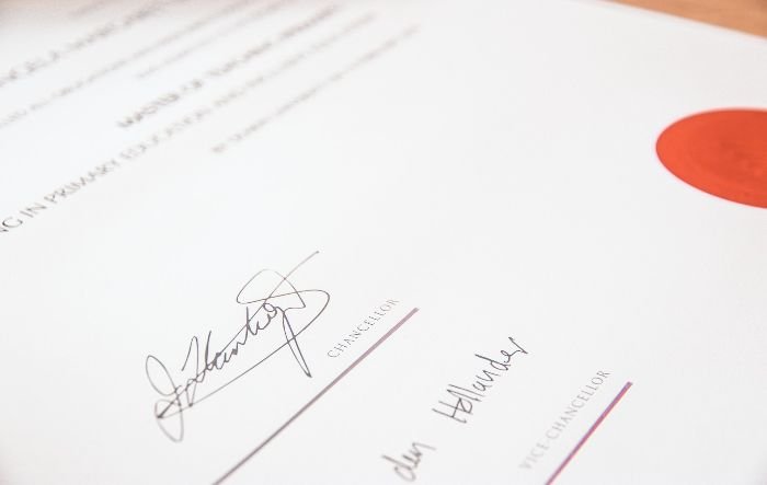 Certificate with signatures, highlighting additional certifications like carpet cleaning