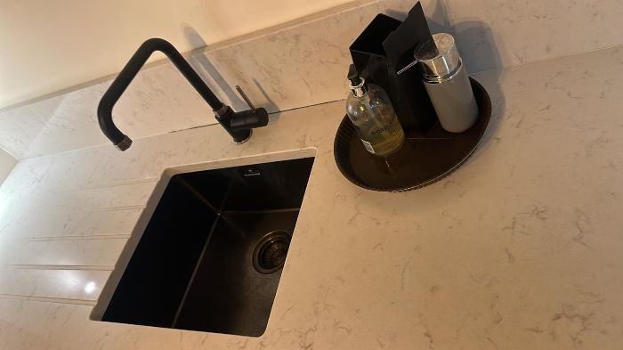 Spotless kitchen sink after end of tenancy cleaning in Finsbury Park, N4