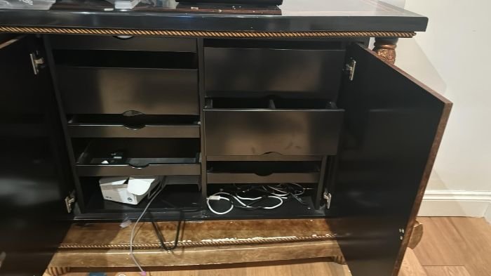 Open kitchen cabinet before deep cleaning during end of tenancy cleaning in Fulham, SW6