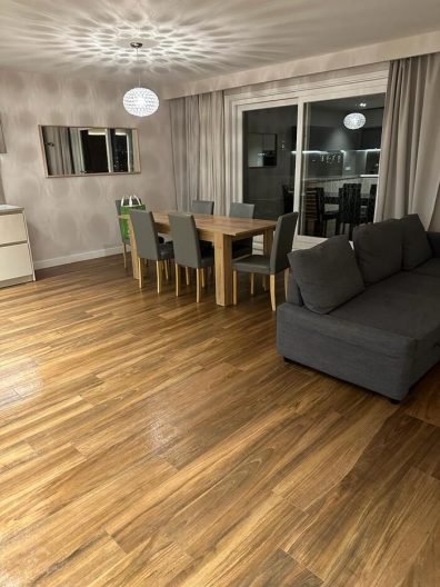 Spotless living room with polished wood flooring after end of tenancy cleaning in Chelsea, SW3