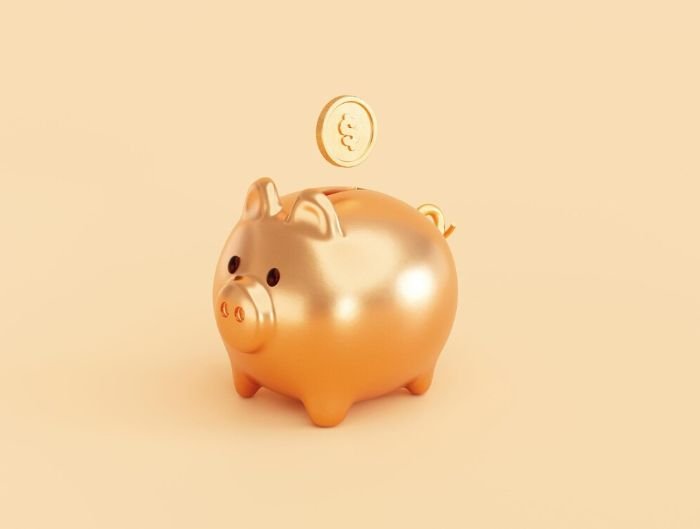 Golden piggy bank with a euro coin, symbolizing cost savings from using all-purpose cleaners for household cleaning needs.