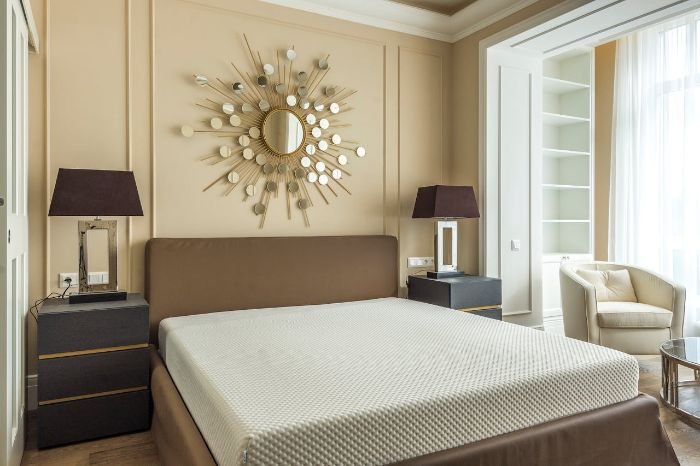 Elegant bedroom with a modern mattress and stylish decor, emphasizing the importance of cleaning your mattress every six months for better hygiene and longevity.